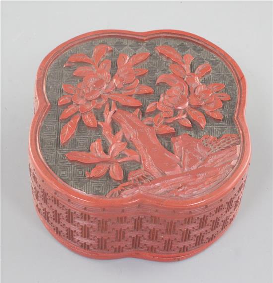 A Chinese two-colour cinnabar lacquer quatrefoil-shaped box, Qianlong period, 7.5cm wide